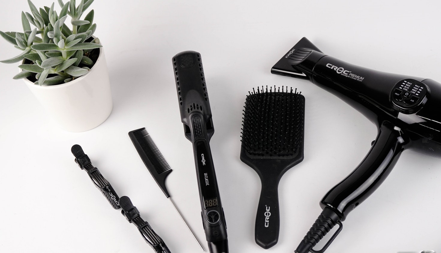 Grooming tools including hairdryer, comb and brush
