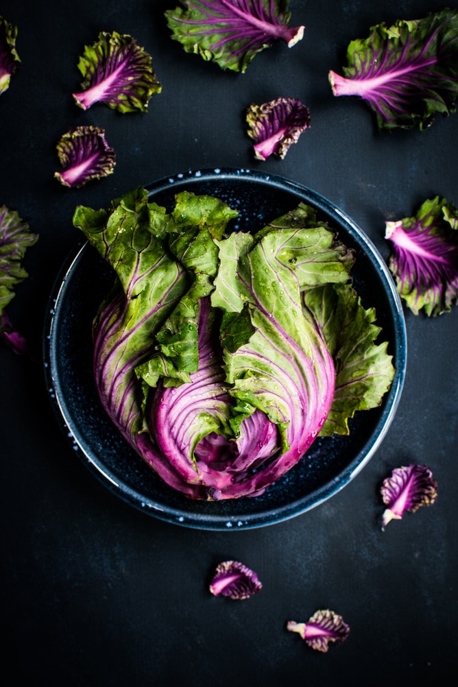 Purple vegetables with black background