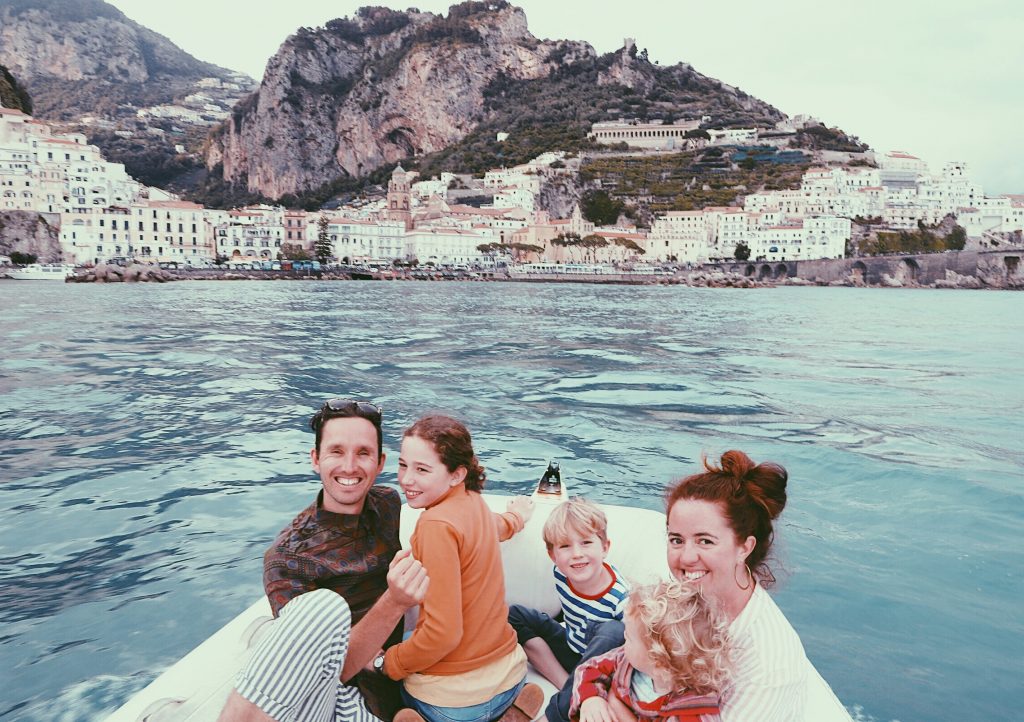 The family in a boat in Amalfi